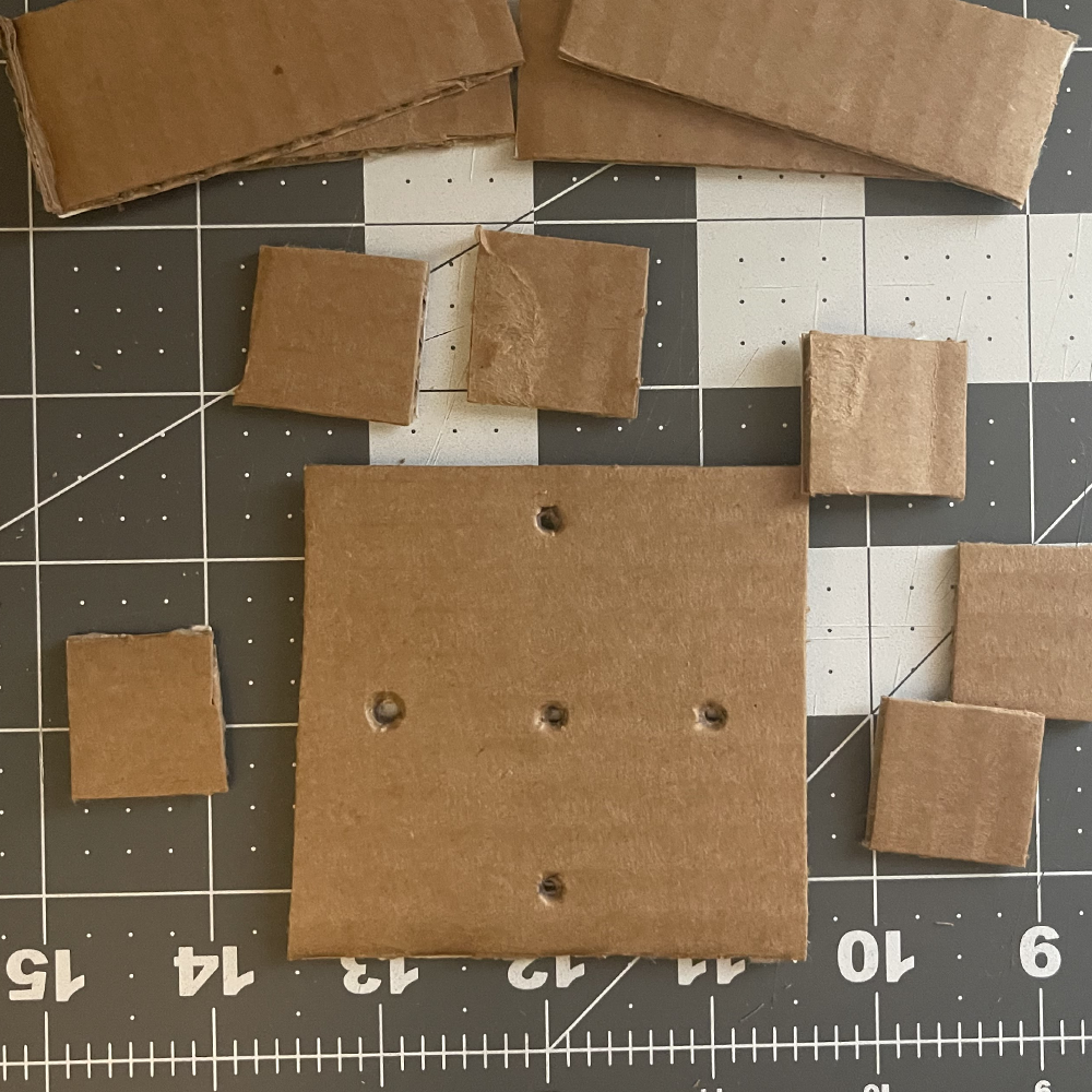 On the back of the dance floor I punched holes in the bottom so I can filter through my wires for the dance floor.