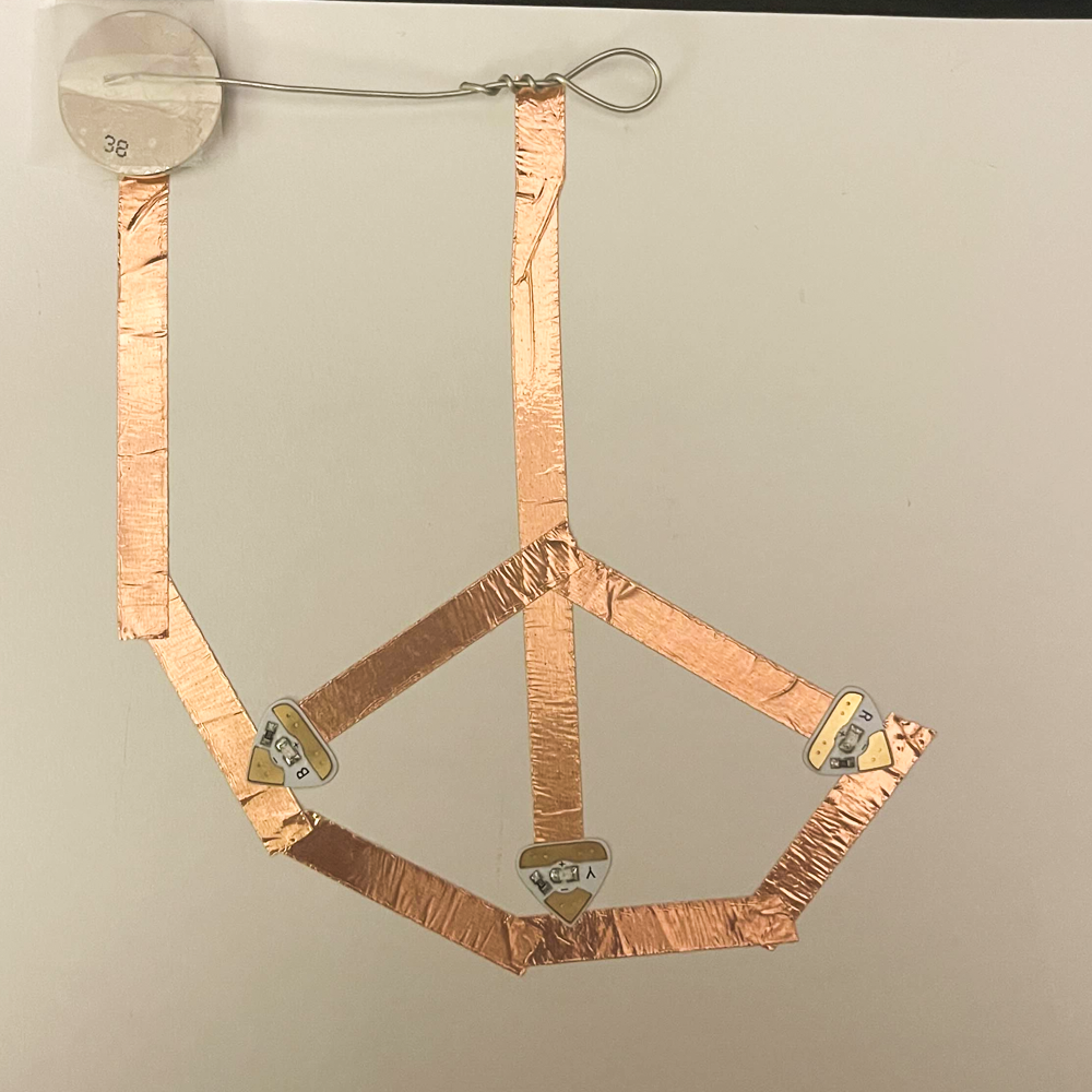 I created this circuit in order to test out a different kind of switch. I wanted more of a button-type of switch for my circuit. Something that would be easier for a user to interact with.