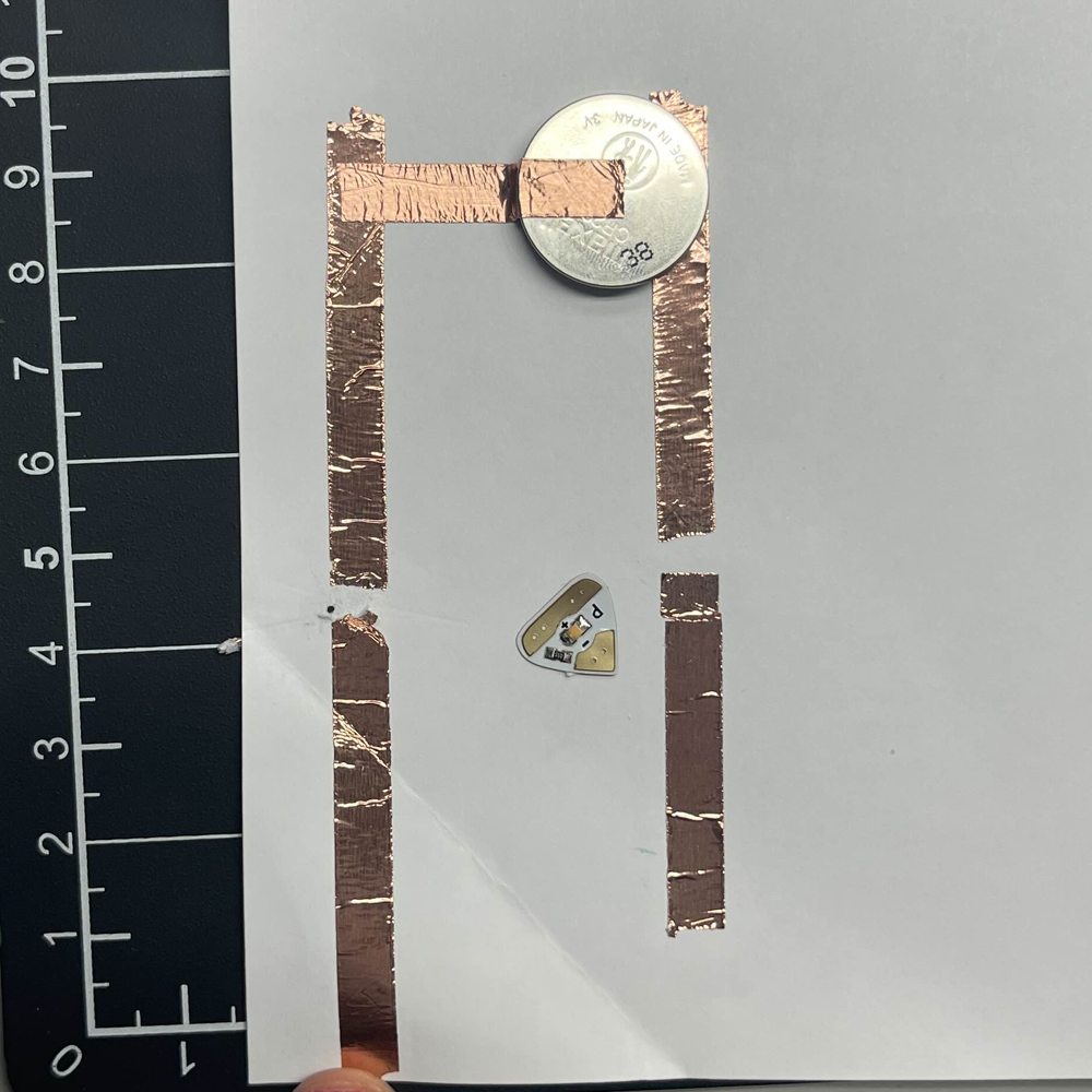 I gave up on trying to make my own circuit and decided to do the example circuit shown in class. I accidently ripped part of the copper tape and broke it.